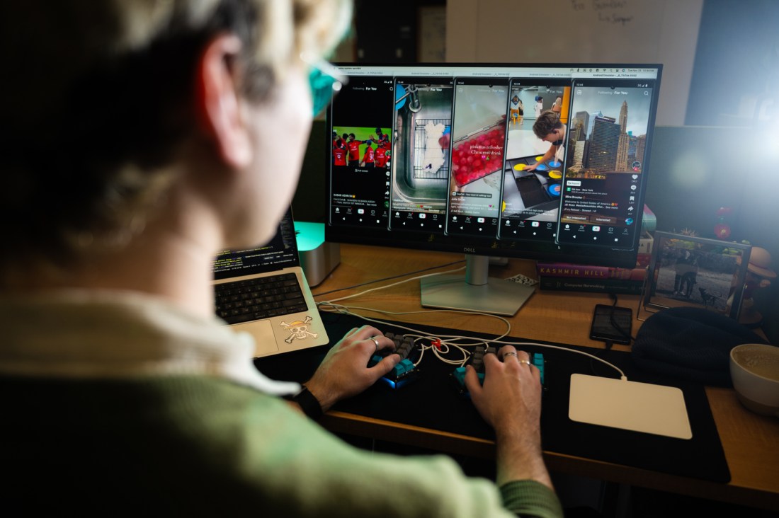 The view from over Levi Kaplan's shoulder as he works on TikTok research.