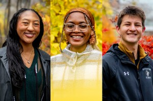 Three smiling Northeastern students dressed variously in fall weather attire.