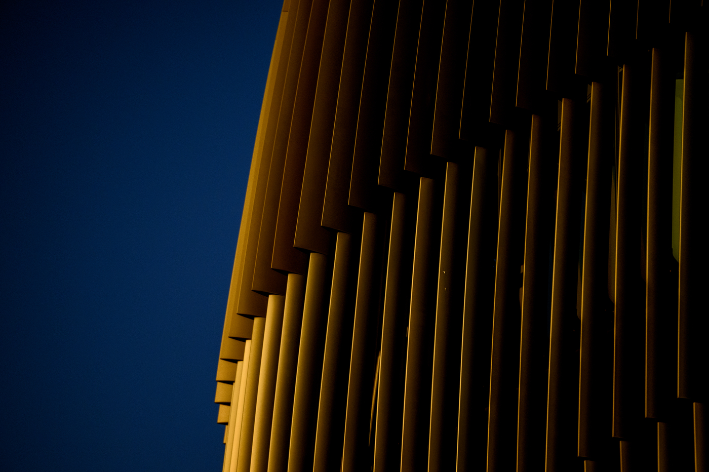 The sunset glows against the architectural detail of the ISEC building.