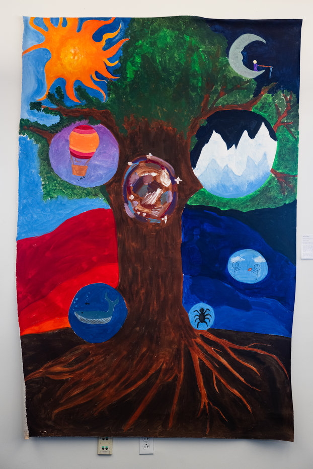 A surreal vertical painting of a large tree.