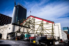 The exterior of Matthews Arena seen against a blue sky.