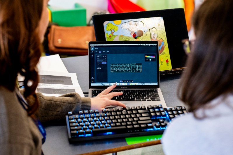 Closeup of laptops showing software.