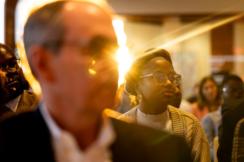 A close up photo of the audience listening to panelists.
