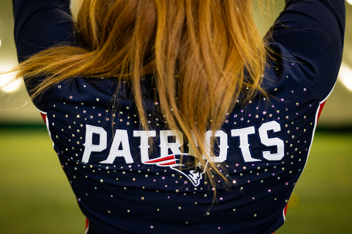 The back of Lana's Cheerleader uniform, with the word Patriots embroidered as well as the logo.