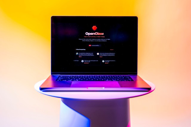 A laptop open on a pedestal to the OpenClaw personal AI assistant screen.