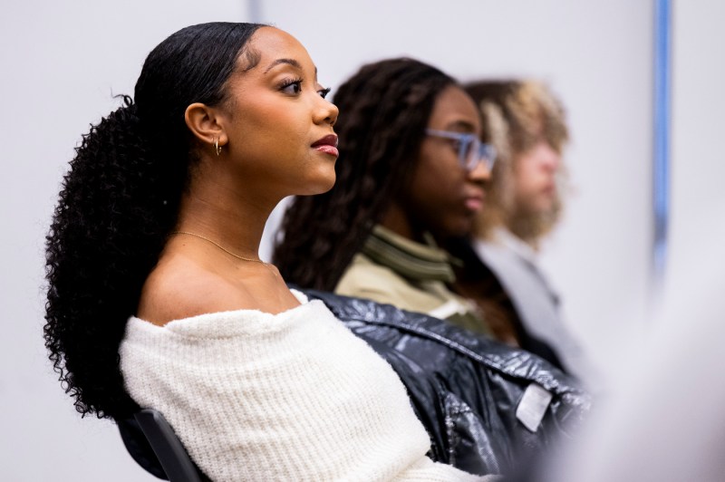 Students sit in the audience during the "A Litany for Survival: Black Studies, Black Scholars, & Black Students" event. 