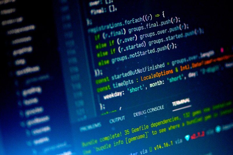 Lines of code displayed on a laptop screen.