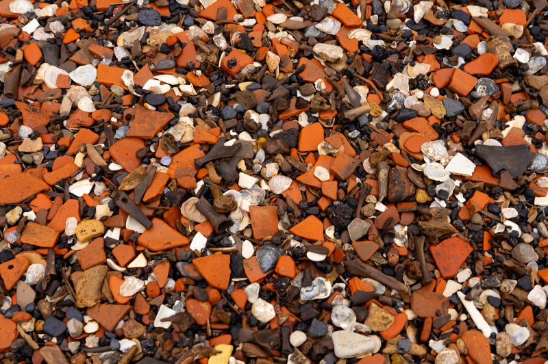 A river bed made up of many materials like stones and rocks