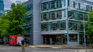Northeastern University Seattle campus building on a city street corner.