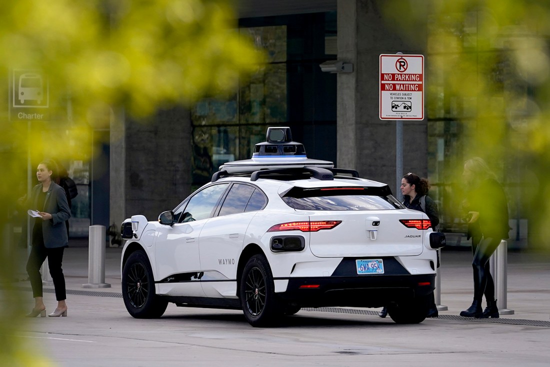 A Waymo vehicle parked on the street.