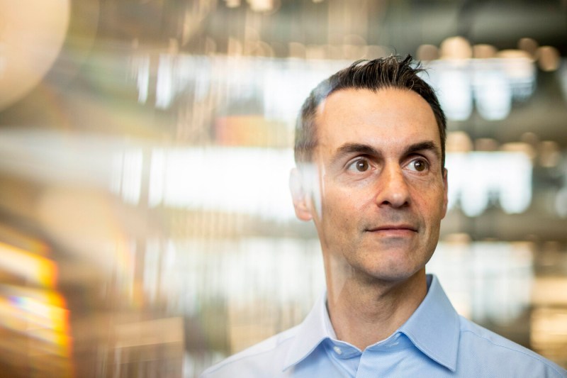 Portrait of Grayson Kimball wearing a blue button down shirt.