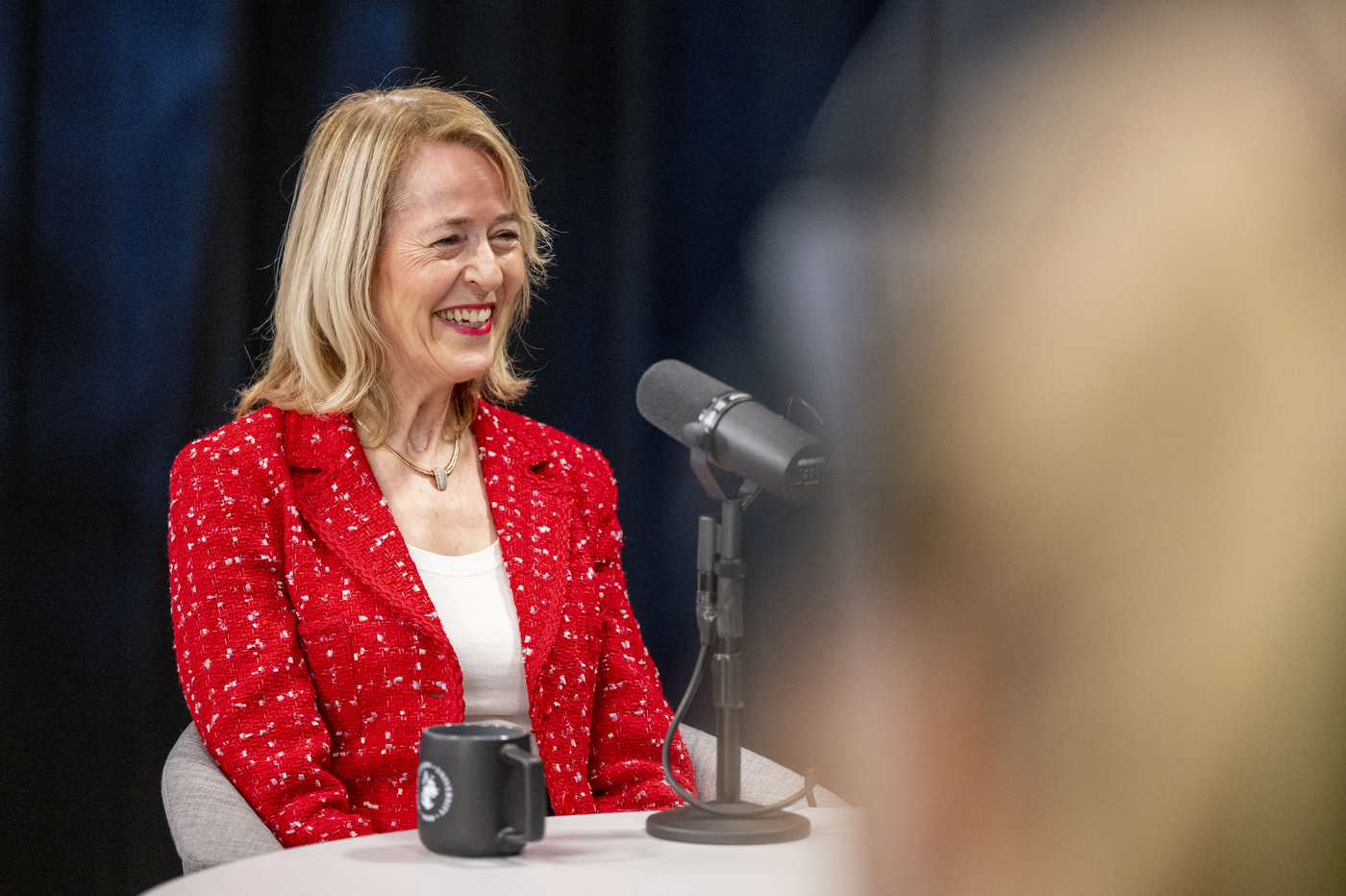 Sheila Puffer smiles during the taping of an NGN Podcast episode at Northeastern University.