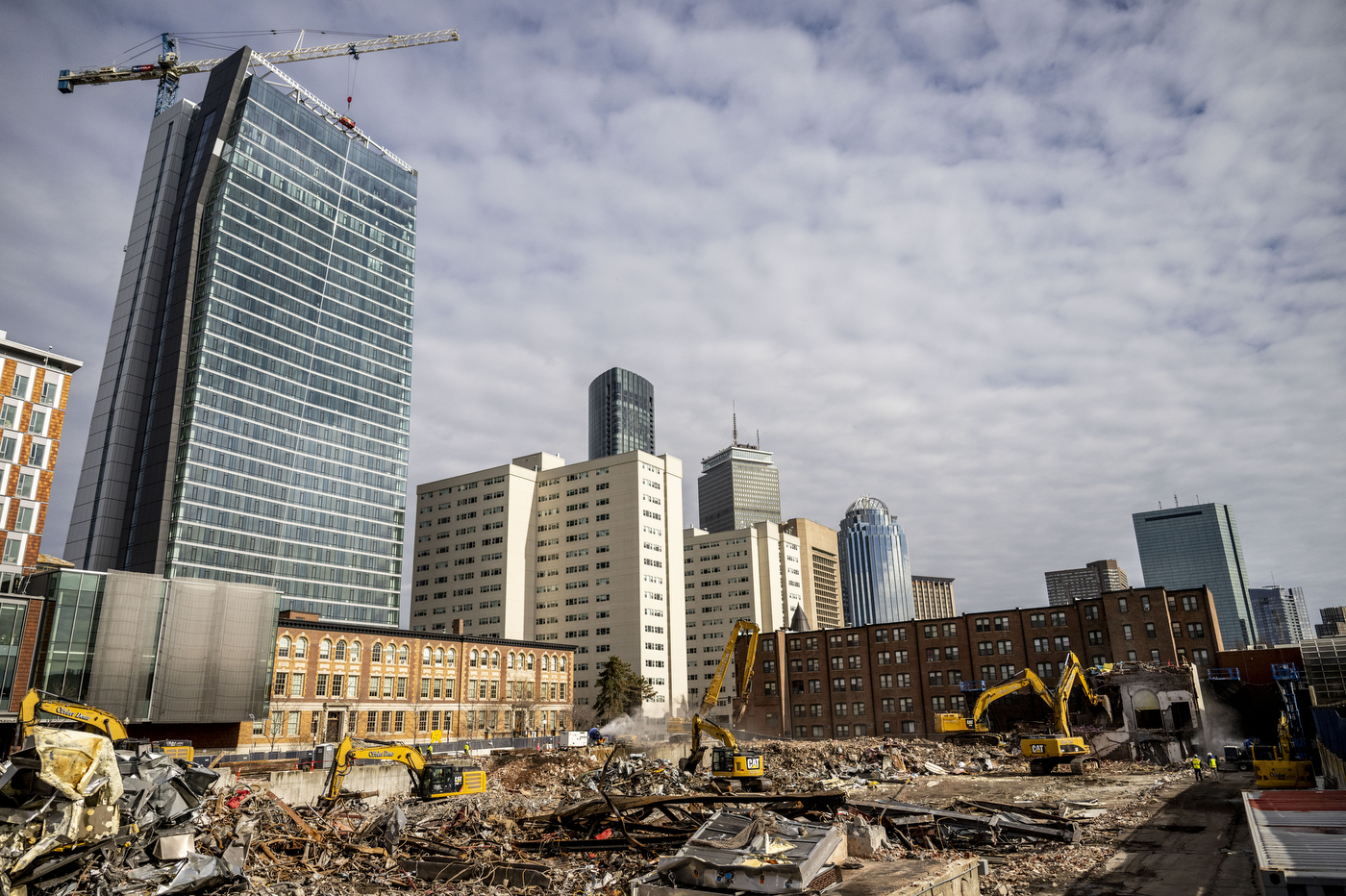The Boston skyline behind the empty lot that held the former Matthews Arena.