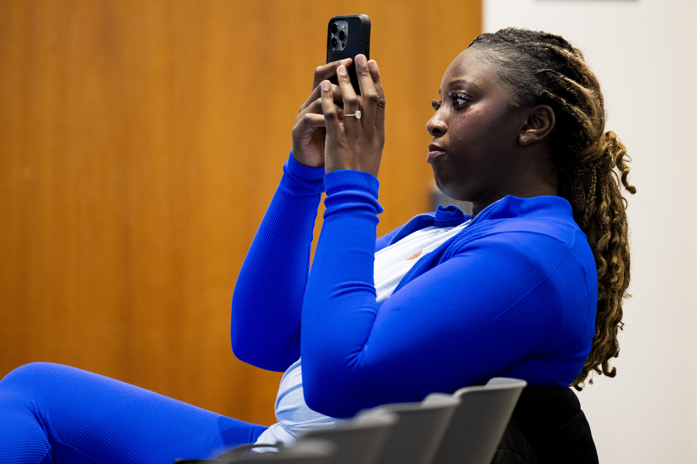 A woman takes video o