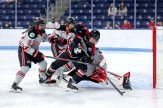 The Huskies clash with the Ohio State Buckeyes on the ice at the Frozen Four.