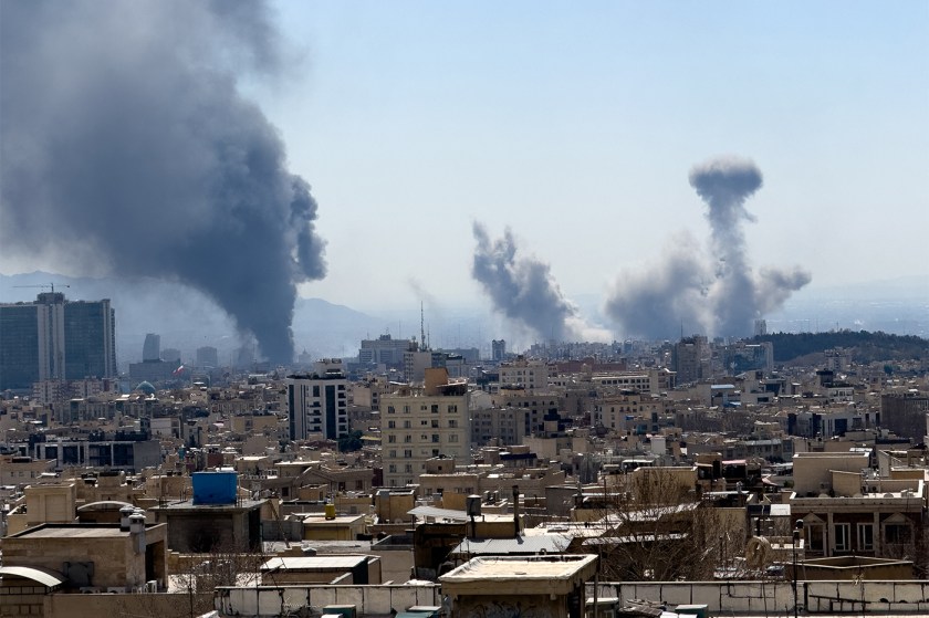 Plumes of smoke rise following reported explosions in Tehran.