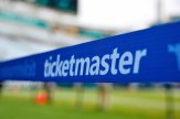 The ticketmaster logo in white text is displayed on a blue side banner along an NFL field.