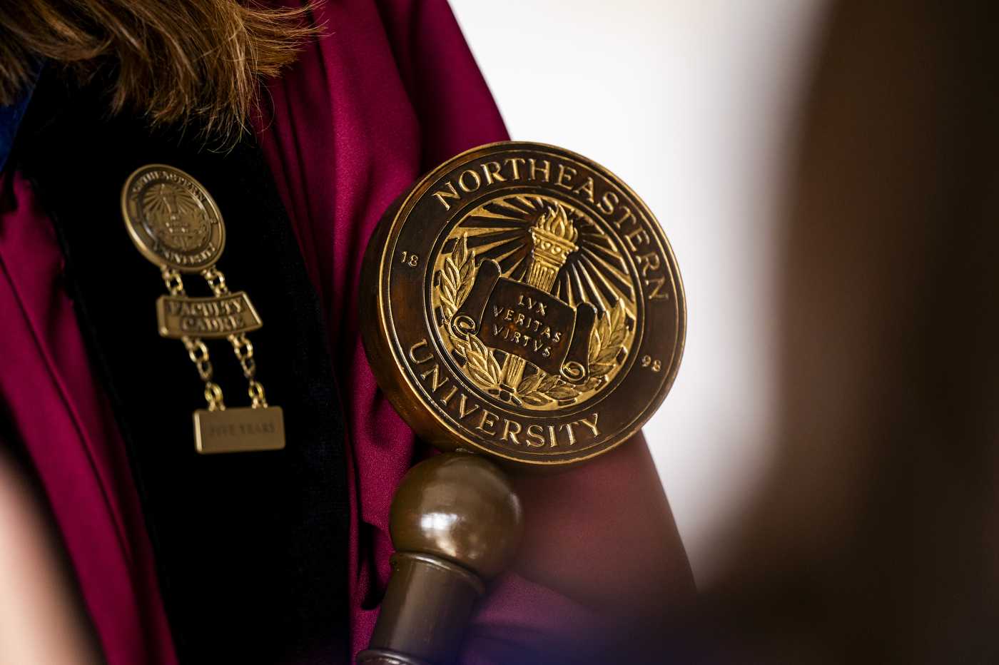 A closeup of the Northeastern CSSH school medallion.