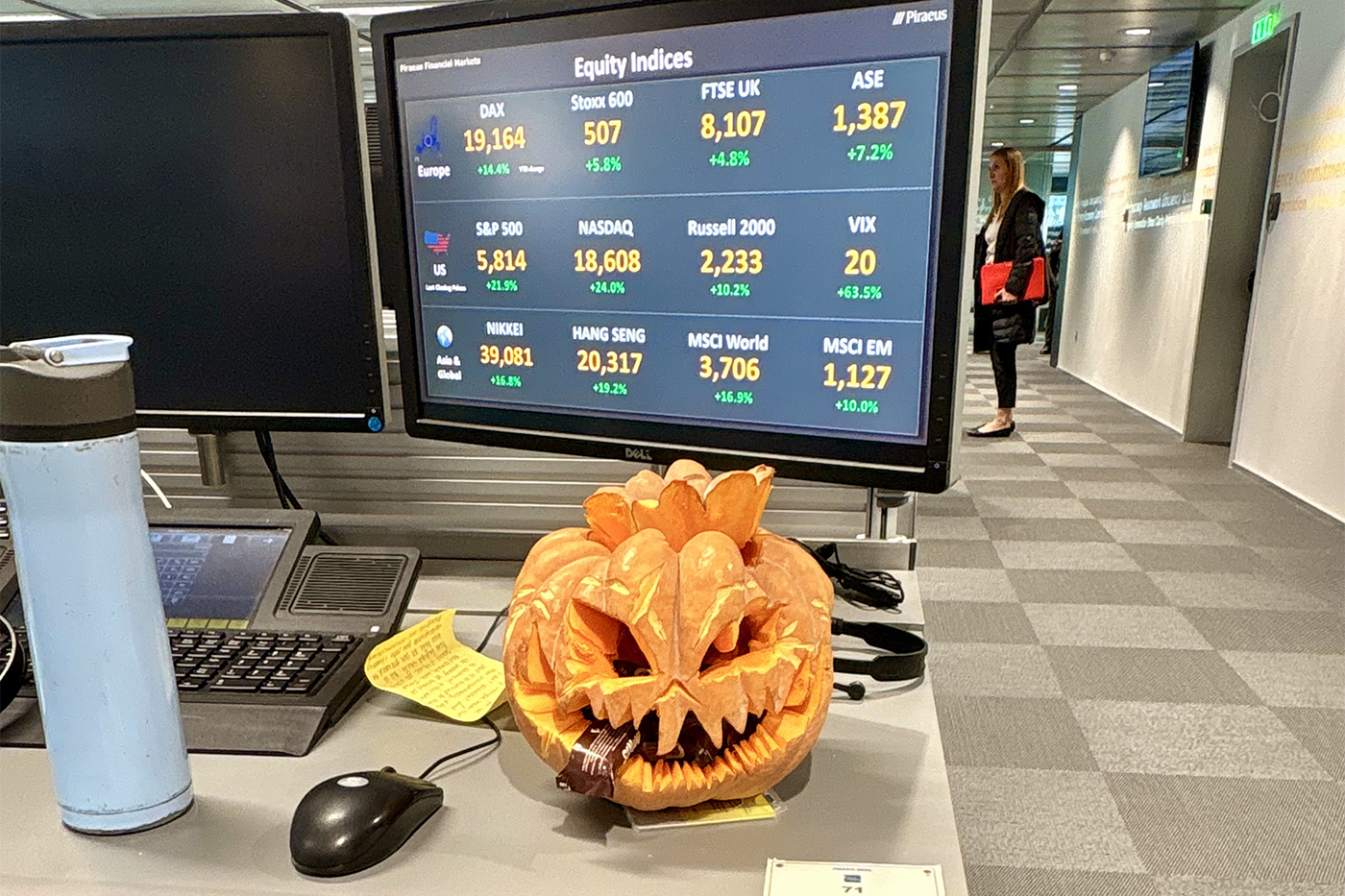 A jack-o-lantern sits on a Northeastern co-op's desk at Piraeus Bank's offices.