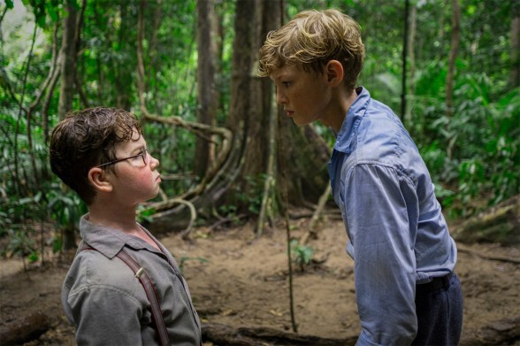 A 'Lord of the Flies' Netflix still showing two boys facing each other in a jungle setting