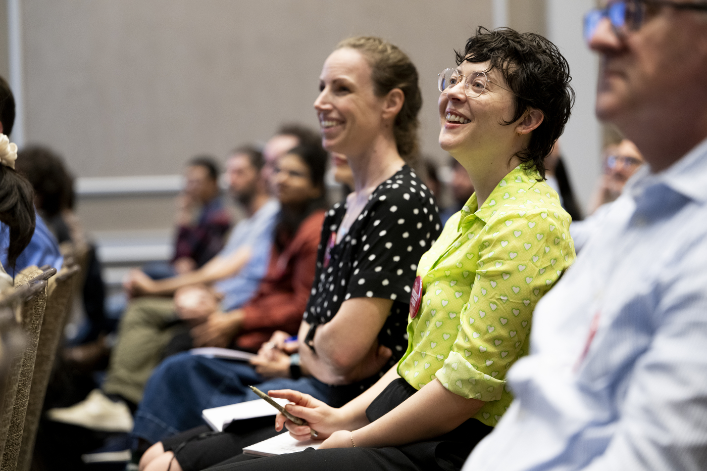 Attendees laughing during a session at NetSci Boston 2026. 