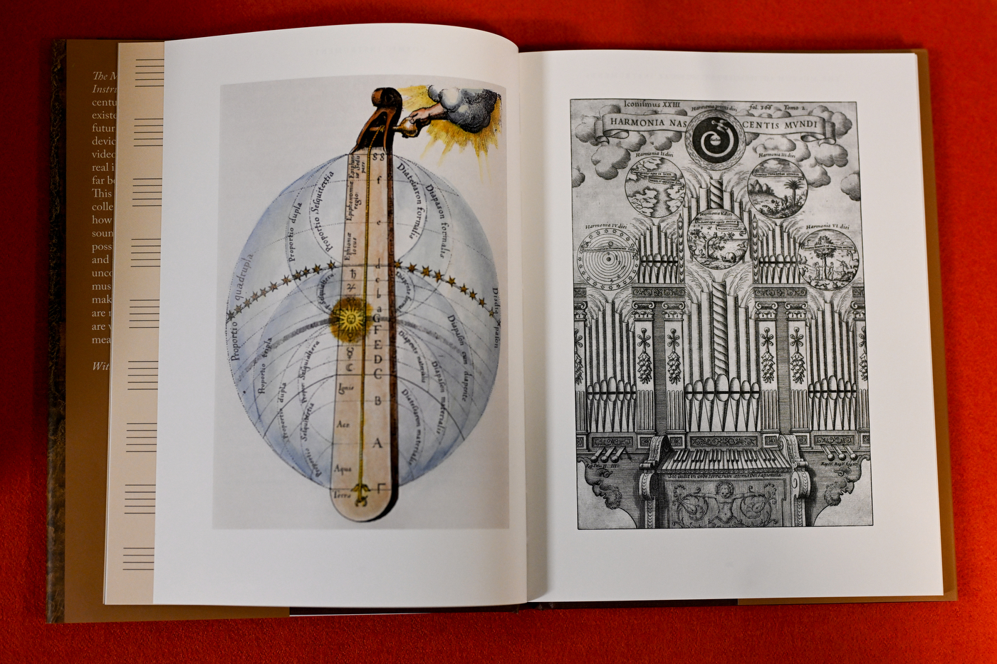 Open book spread showing an illustration of a stringed instrument overlaid on a celestial globe alongside an engraving of an ornate pipe organ.