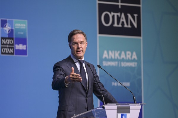 NATO Secretary General Mark Rutte speaking at a lectern during a press conference.