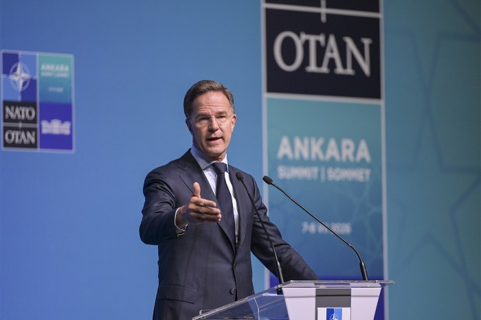NATO Secretary General Mark Rutte speaking at a lectern during a press conference.