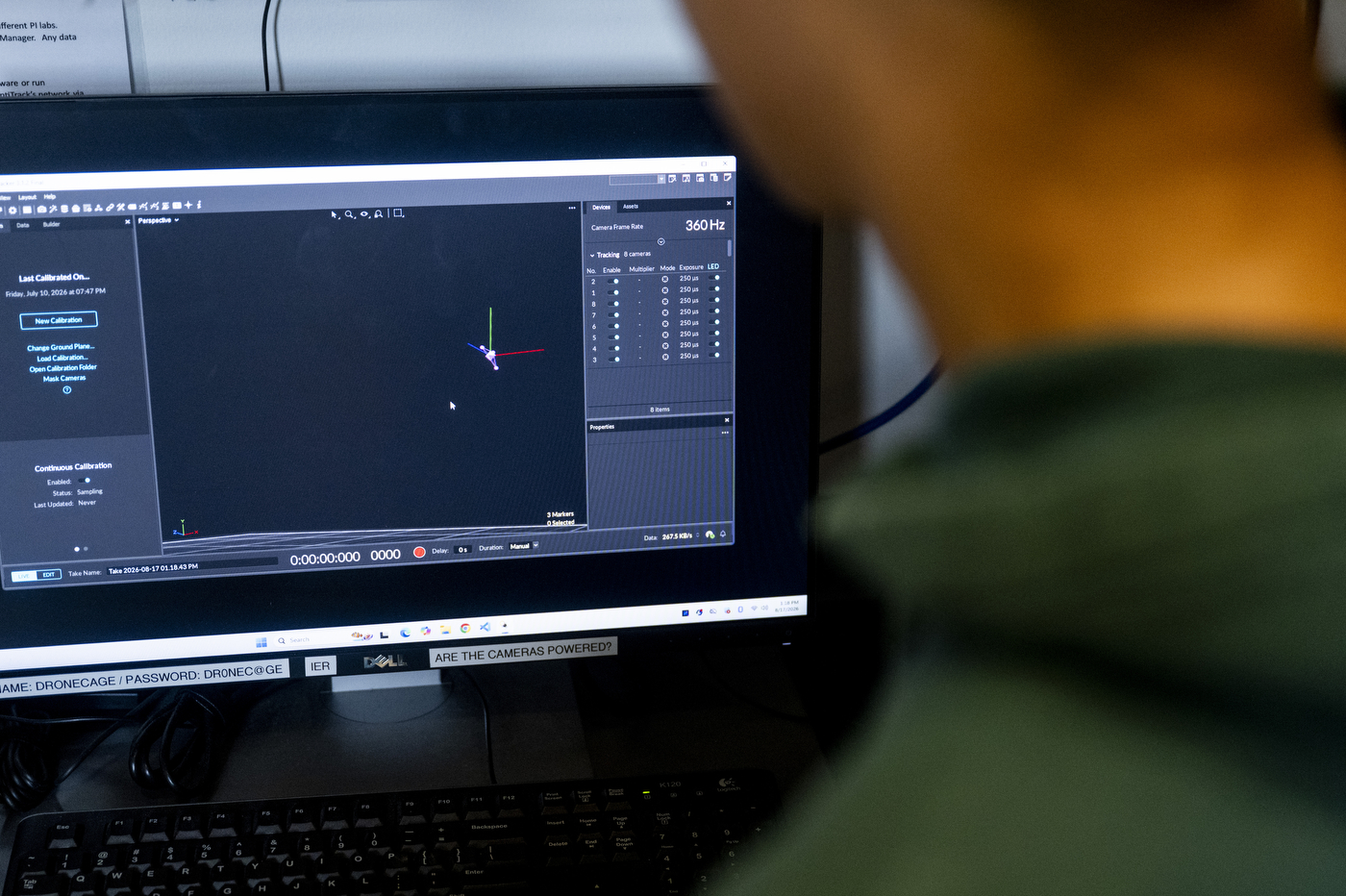 Computer monitor displaying motion capture tracking software during a robotics test in the EXP robotics high bay lab.