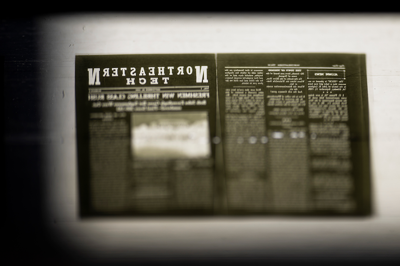 Close-up of microfilm projected on the reader screen, showing a page from The Northeastern News.