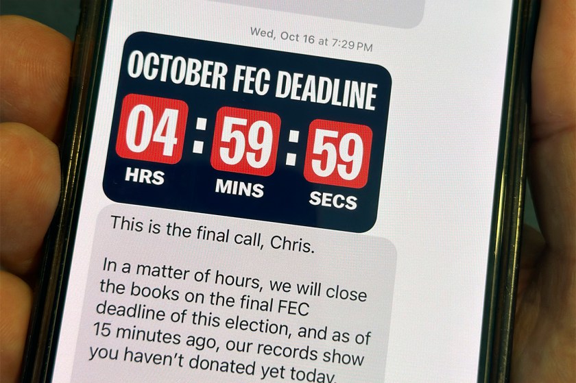 A text message containing political information is viewed on a mobile device.