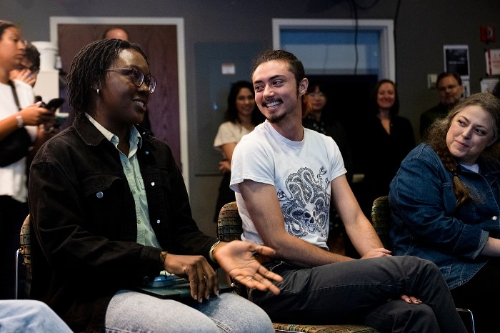 Northeastern president Joseph Aoun visits a classroom investigating a digitized West African heritage site.