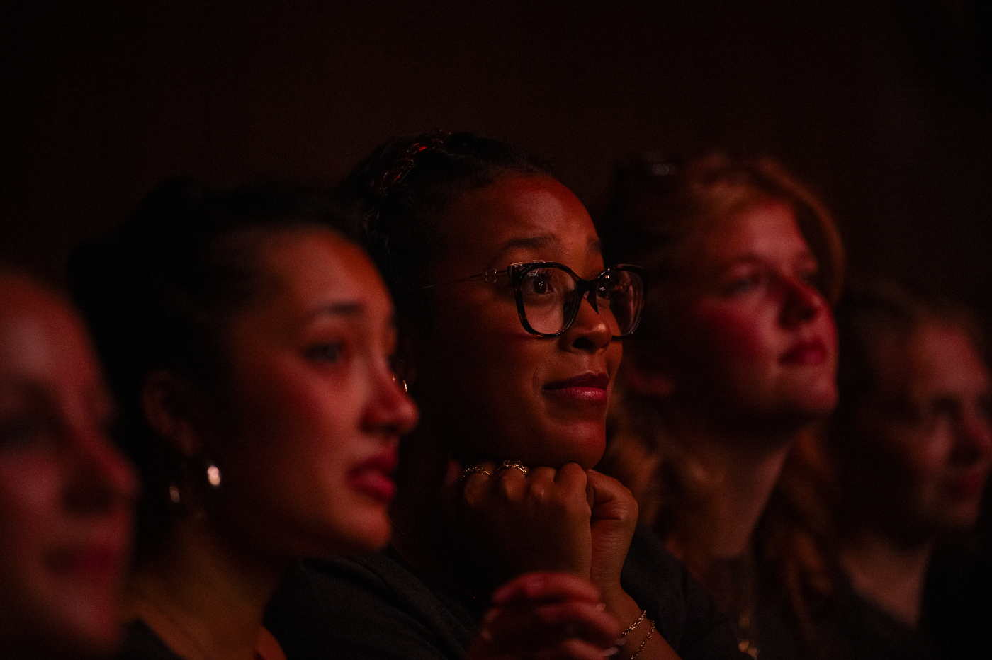 Students watch the proceedings from the audience during the New York City convocation.
