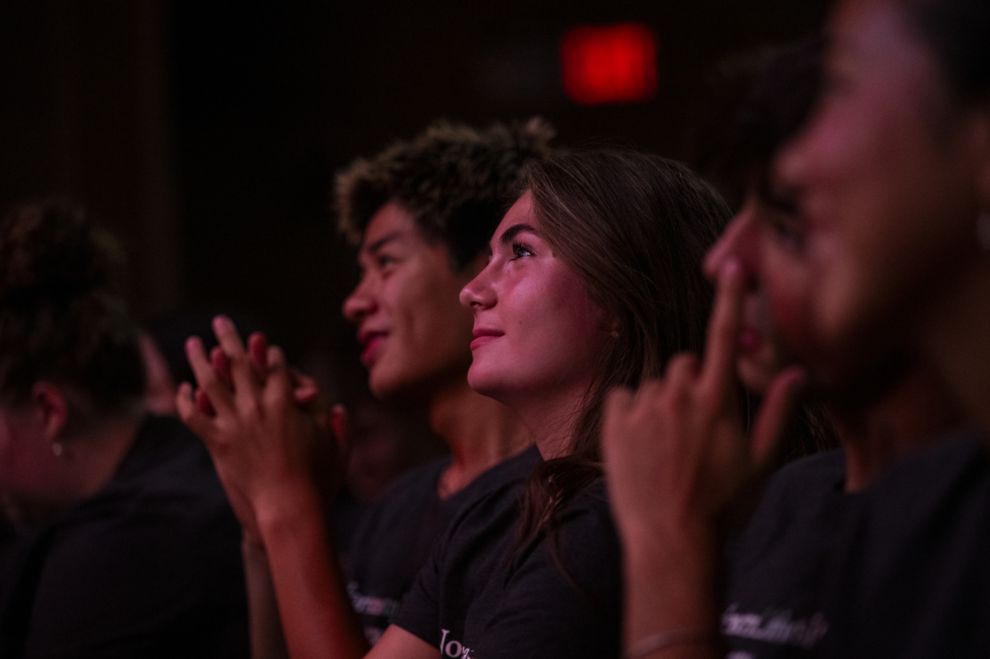 Students watch the proceedings from the audience during the New York City convocation.