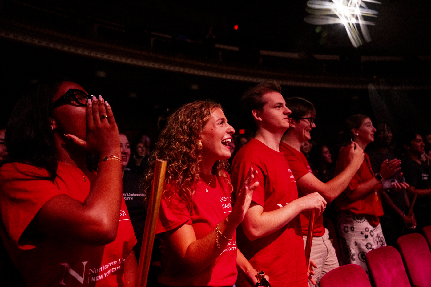 Students applaud and cheer during the New York City convocation.