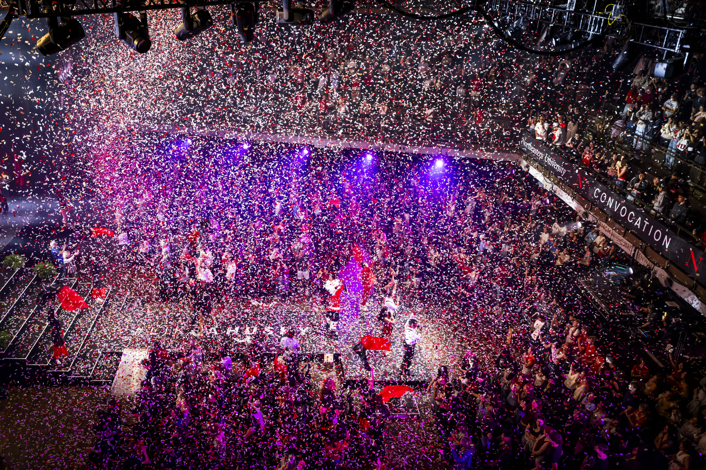 Aerial view of confetti falling over crowd at Convocation.