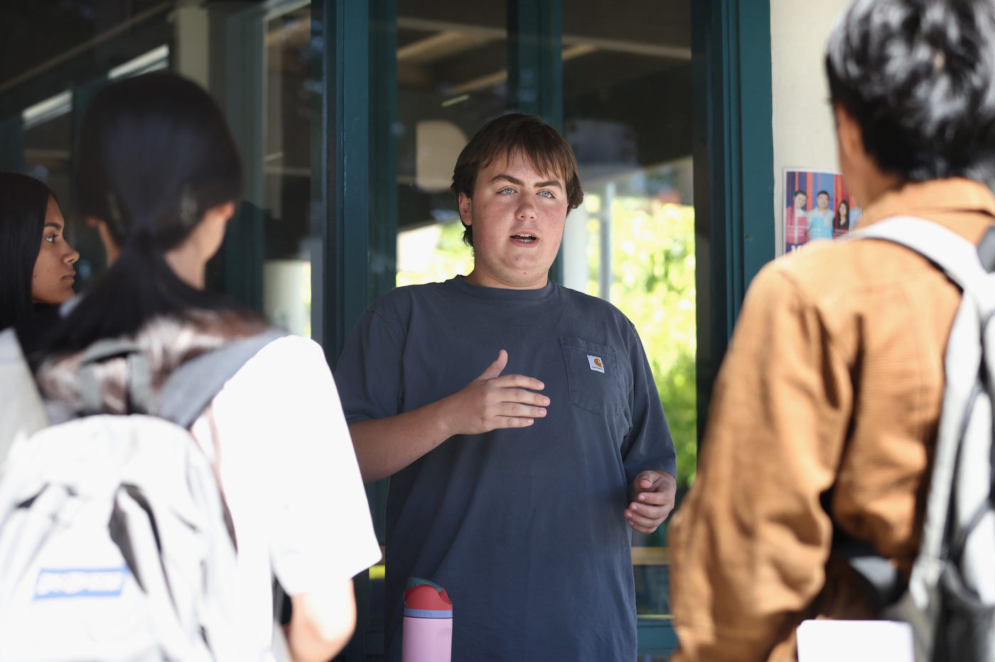 Students talk during an tabling event.